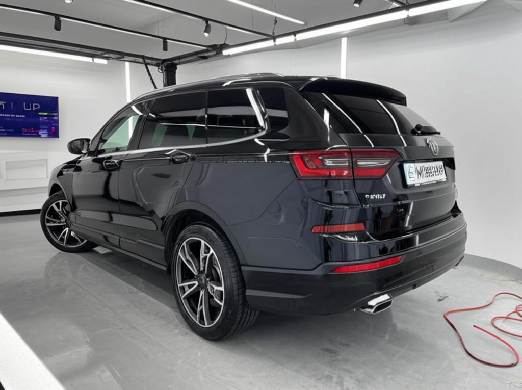 Car being professionally wrapped with TPU film