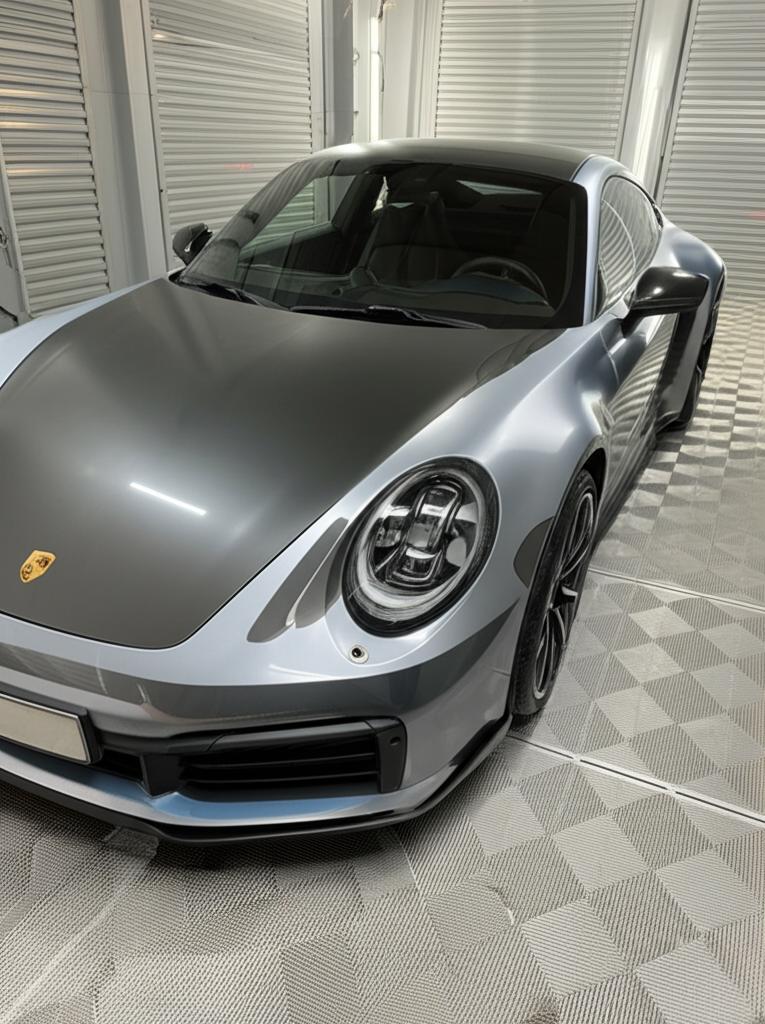 Porsche 911 with TPU film applied, showcasing the seamless and protective finish.