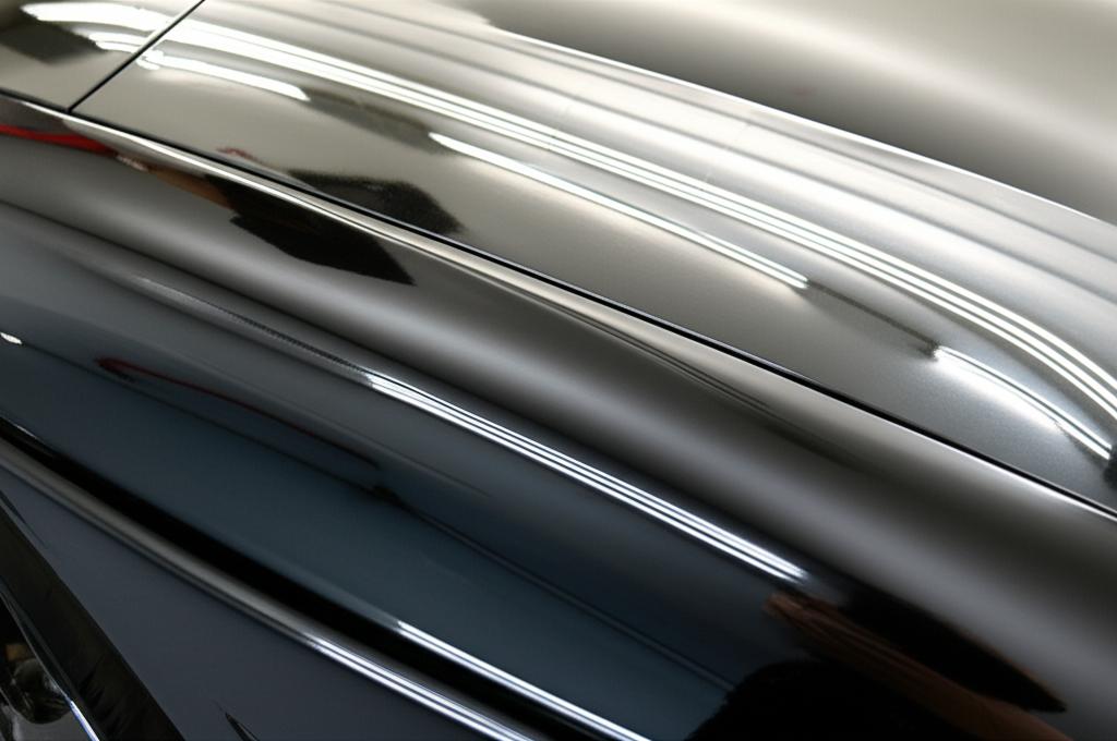 A perfectly wrapped car gleaming under the sun, showing paint protection